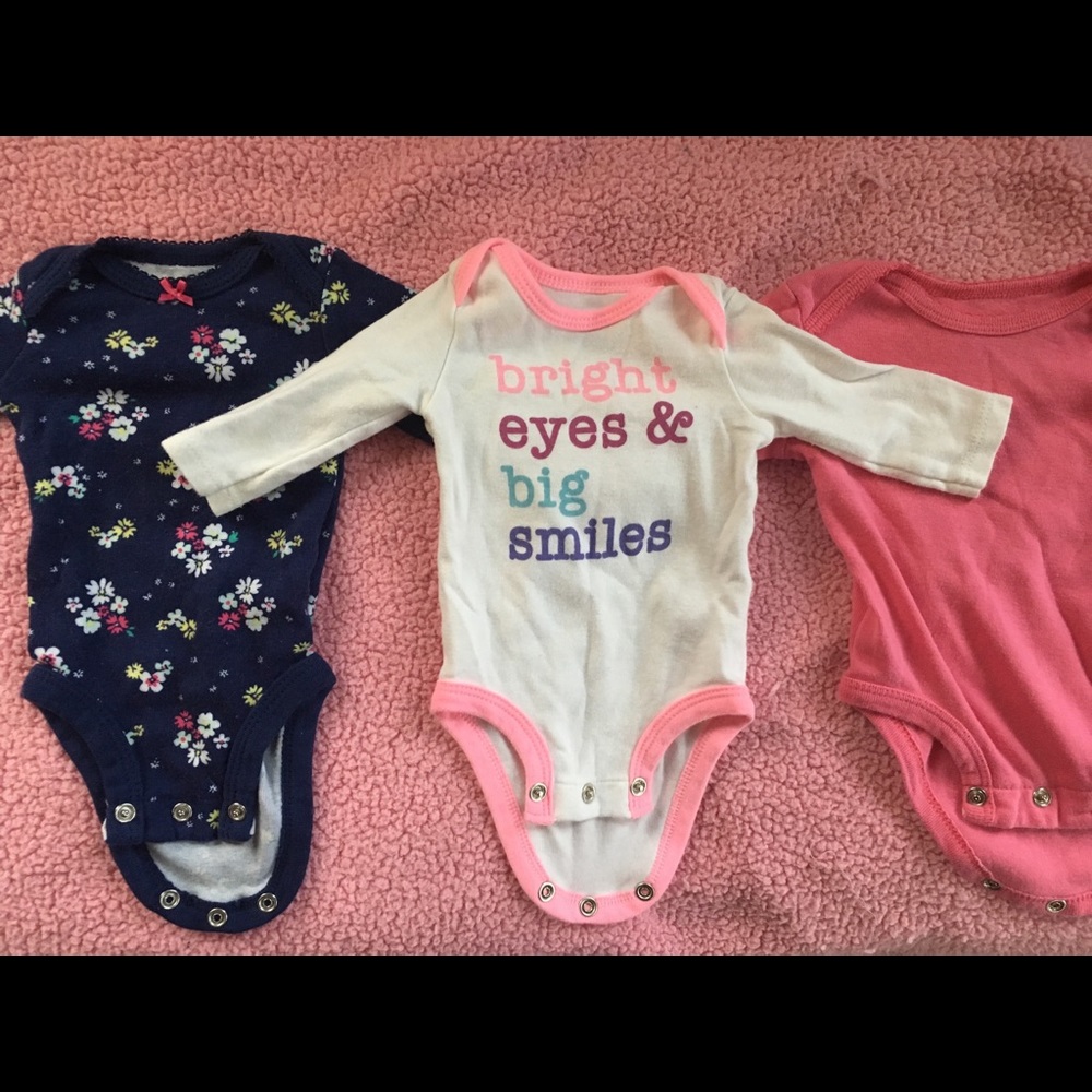 Large lot of newborn clothing for girls